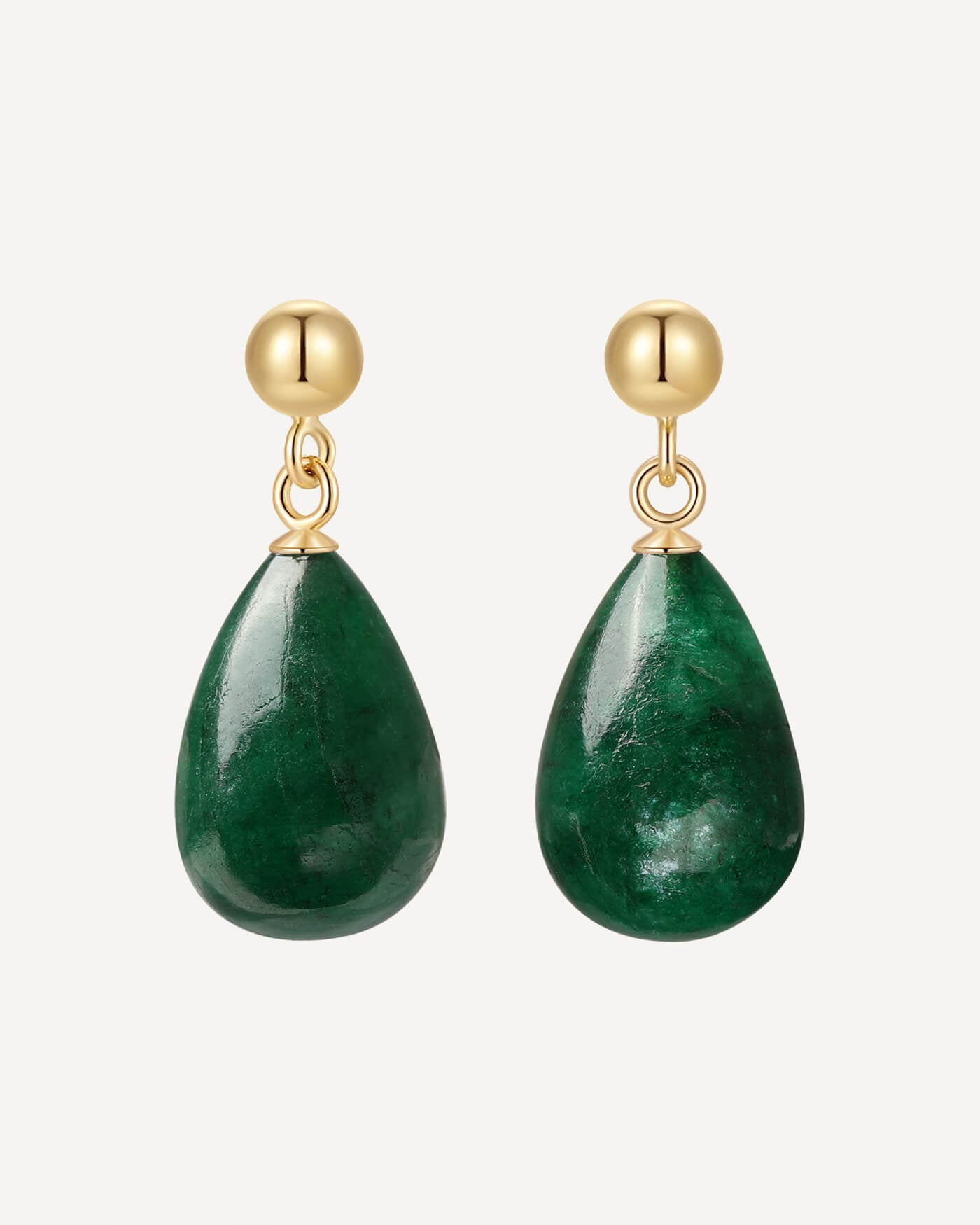 Green teardrop earrings with gold hooks on a white background